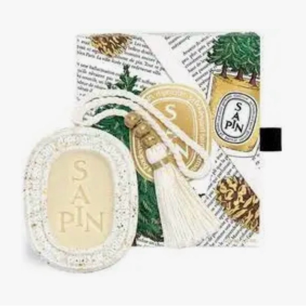 Diptyque Sapin Scented Oval with Green and Gold Accents